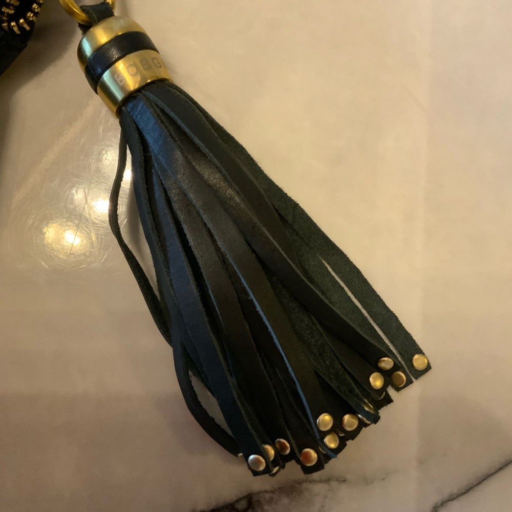 BCBGMaxAzria Black foldable Clutch ,tassel charm with Gold Details. - Picture 13 of 16